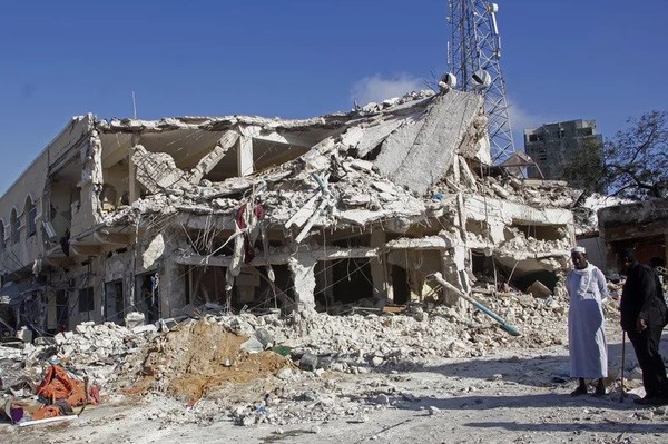 Fig. 1: A destroyed building due to the twin car bombing (https://n.pr/3EBGjcp)